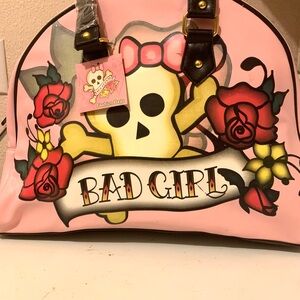 Pink Cookie Travel Bag with Bold Skull Design
